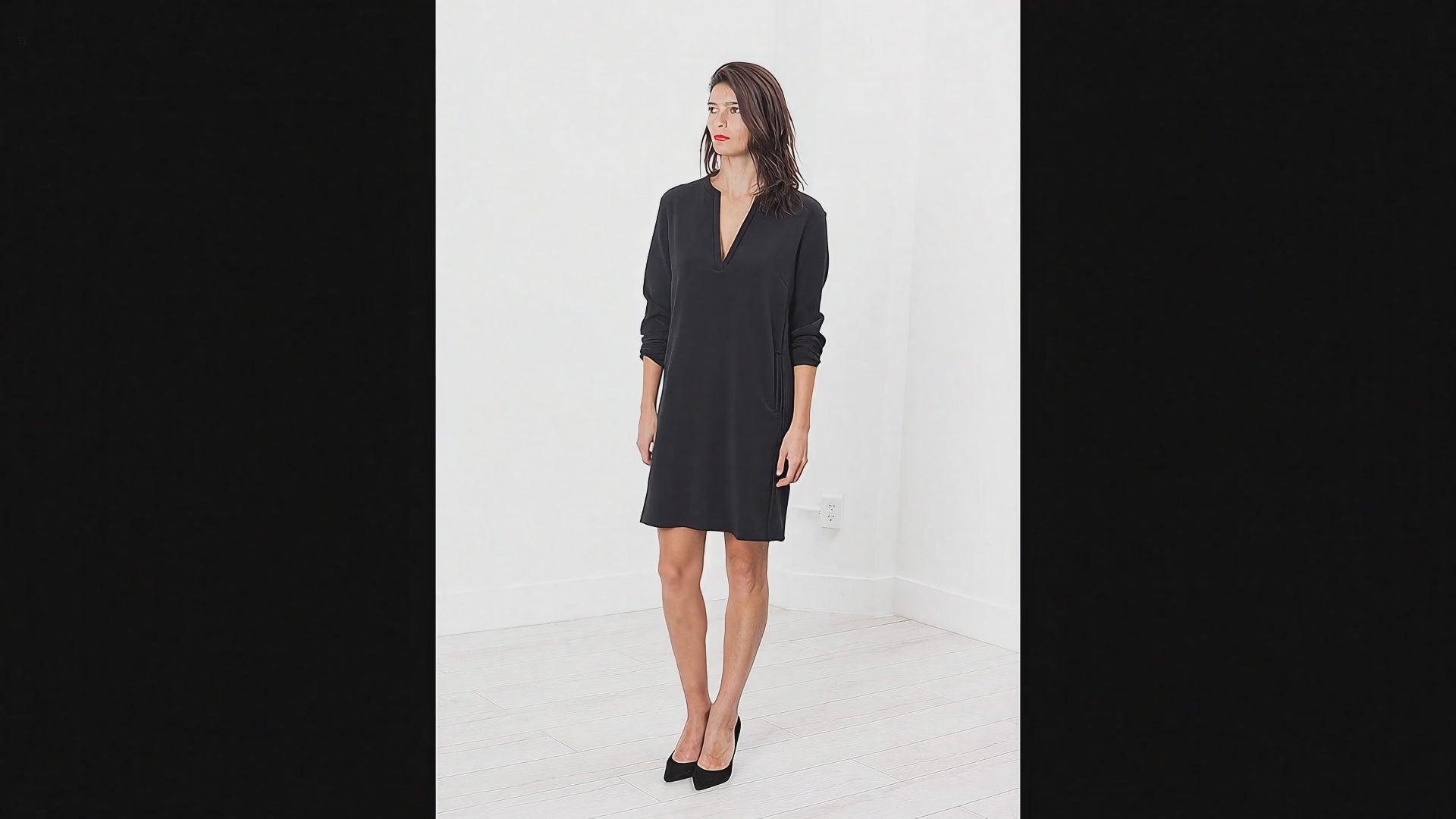 Create a realistic video of this person moving to show the dress